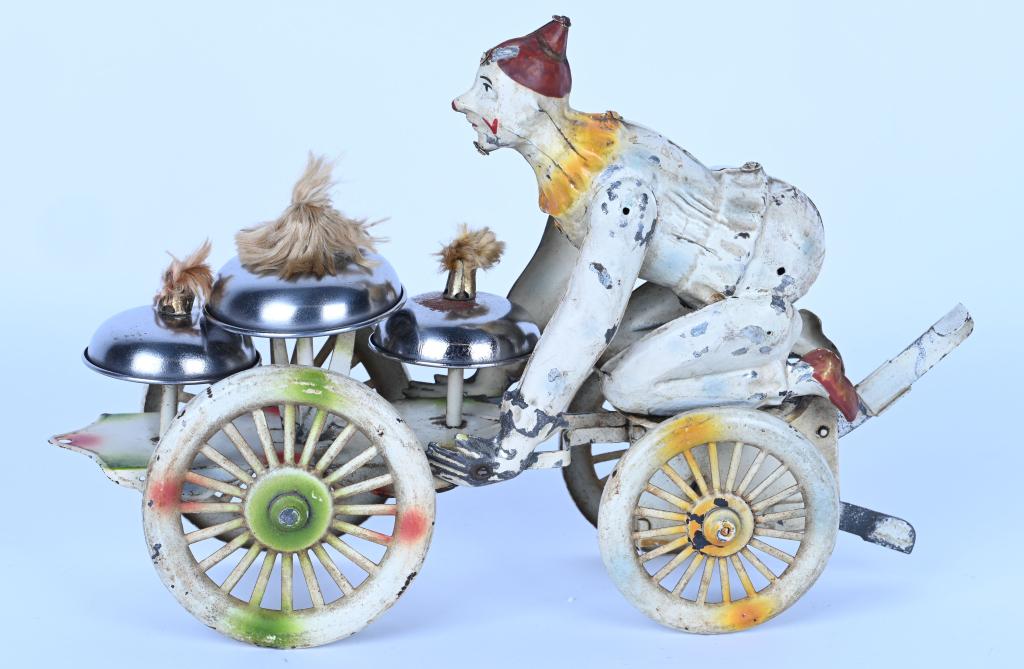 GERMAN HAND-PAINTED WINDUP OVERSIZE CLOWN BELL TOY: Large and impressive Gunthermann Hand painted Tin Oversize Clown on Platform Bell Toy. All original with very nice paint. Push windup works ell. Clown has professionally retabbed arms and 1 leg. A gre