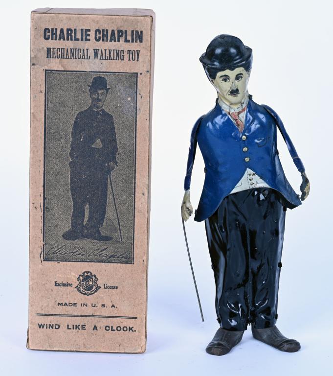 B&R TIN WINDUP CHARLIE CHAPLIN WALKER w/ BOX: B&R tin windup Charlie Chaplin Walker. All original and complete. Has both original arms and cane. Windup is slipping. Comes with scarce Box. 8 3/4" Excellent