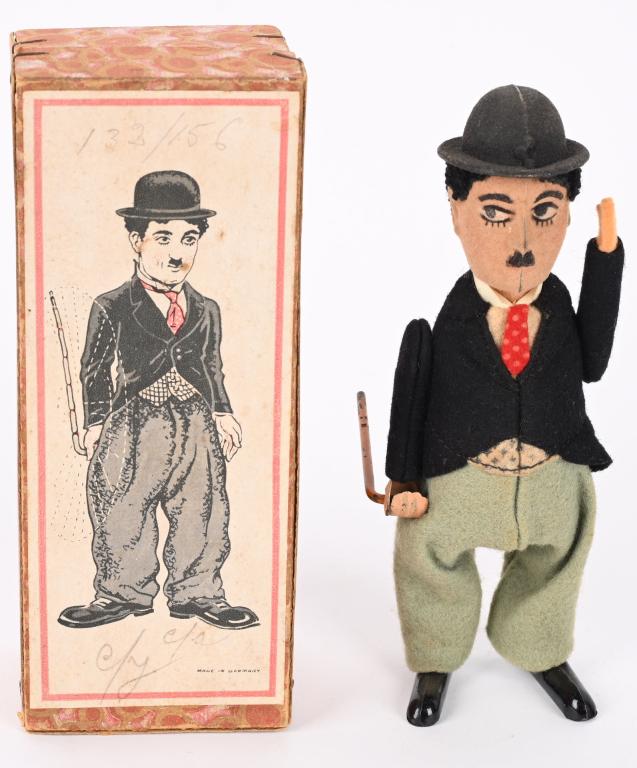 SCHUCO WINDUP CHARLIE CHAPLIN w/ BOX: German windup Charlie Chaplin. All original in great condition. Toy has nice bright colors. Windup works. Comes with Box. 6 1/2" Excellent