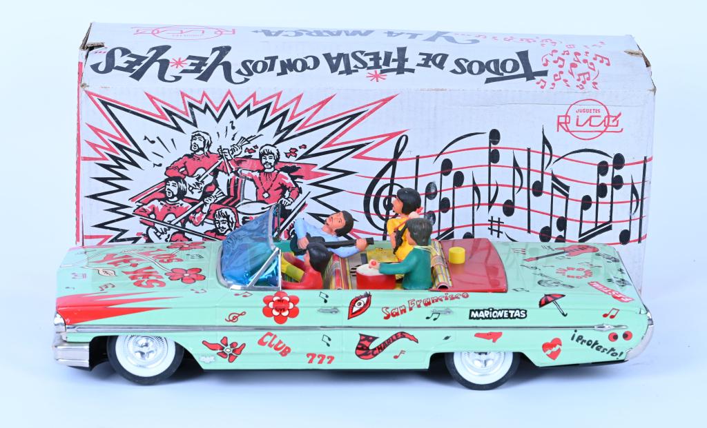 RICO BATTERY OP LOS YE-YES BEATLES CAR w/ BOX: Great looking tin battery operated convertible with The Beatles riding inside. One figure is driving while others have instruments. Toy is in never played with condition. Still has Directions Tag. Wor