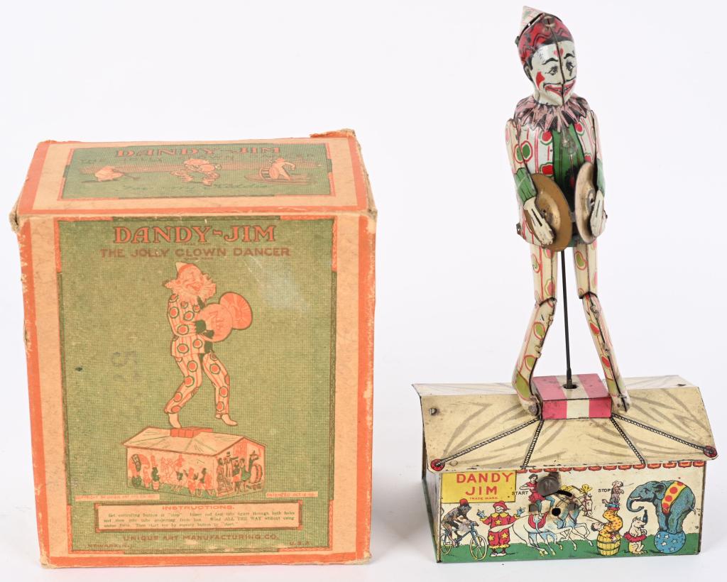 UNIQUE ART TIN WINDUP DANDY JIM w/ BOX: Unique Art windup Dandy Jim the Clown. All original and complete. Toy has nice Circus graphics. Windup works. Comes with unusual box variation. 10" Excellent