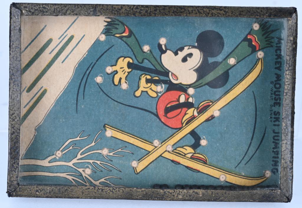 MICKEY MOUSE SKI JUMPING DEXTERITY TOY: Early Pie-Eyed Mickey. Mickey Mouse Ski Jumping Dexterity Toy. Great image of Mickey on Skis. Very nice colors. 6" Excellent