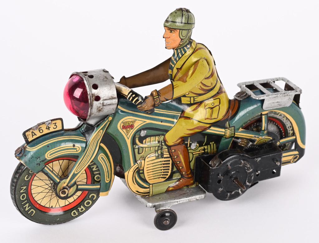 ARNOLD TIN WINDUP CIVILIAN MOTORCYCLE: German tin windup Civilian Motorcycle. Blue in color. All original and complete. Very nice condition. Windup works. 7 1/2" Excellent