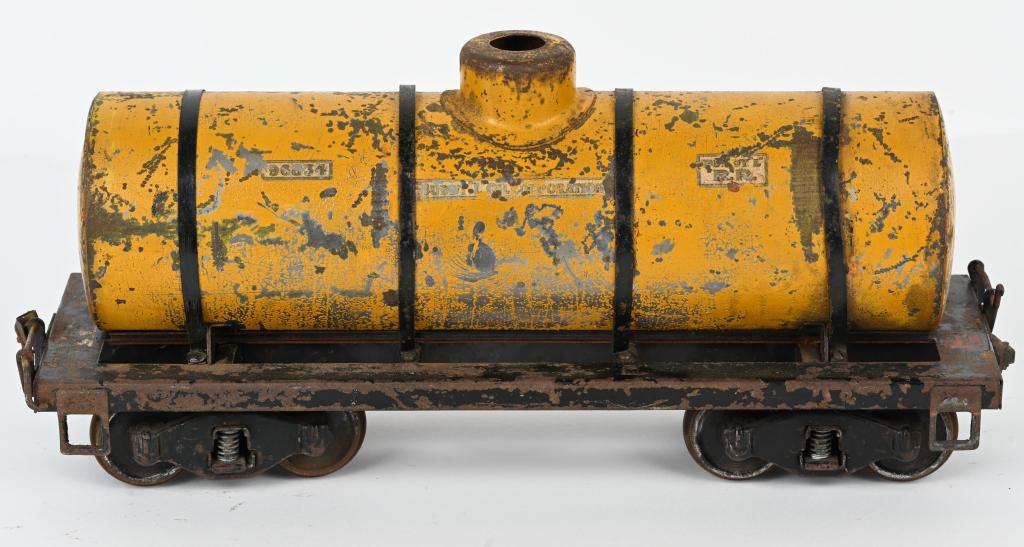 BUDDY L OUTDOOR RAILROAD YELLOW TANK CAR: Scarce Buddy L Outdoor Railroad Yellow Tank Car. All original paint and decals. Cap is missing. 20" Very Good