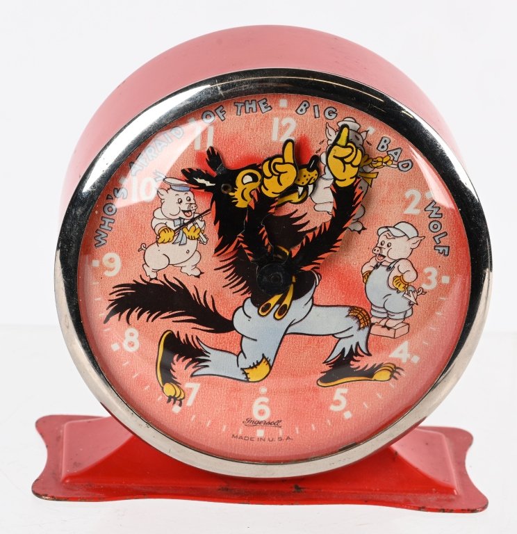 1934 INGERSOL BIG BAD WOLF ALARM CLOCK: Nice original 1934 Three Little Pigs and Big Bad Wolf Alarm Clock. Great image on face of Wolf and 3 Pigs. Works great and Wolf's mouth opens and closes. Case in in great shape. A nice early Disney Al