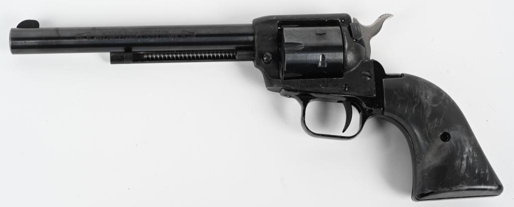 HERITAGE ROUGH RIDER .22LR REVOLVER: SERIAL NUMBER: 1BH045868. BARREL: 6-1/2" CALIBER: .22LR. MANUFACTURED: 2010's. Blade front sight and u-notch rear. Original blued/matte finish. Synthetic grips. CONDITION: Metal is good overall, with 