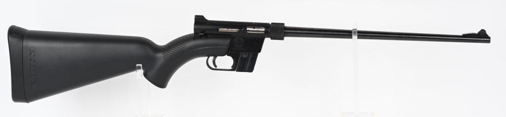 AR-7 EXPLORER SEMI AUTOMATIC SURVIVAL RIFLE: SERIAL NUMBER: D005007. BARREL: 16". CALIBER: .22LR. MANUFACTURED: 2000'S. Based on the original Armalite design. Blade front sight and peep rear (missing insert). Black enamel finish. Stock looks to