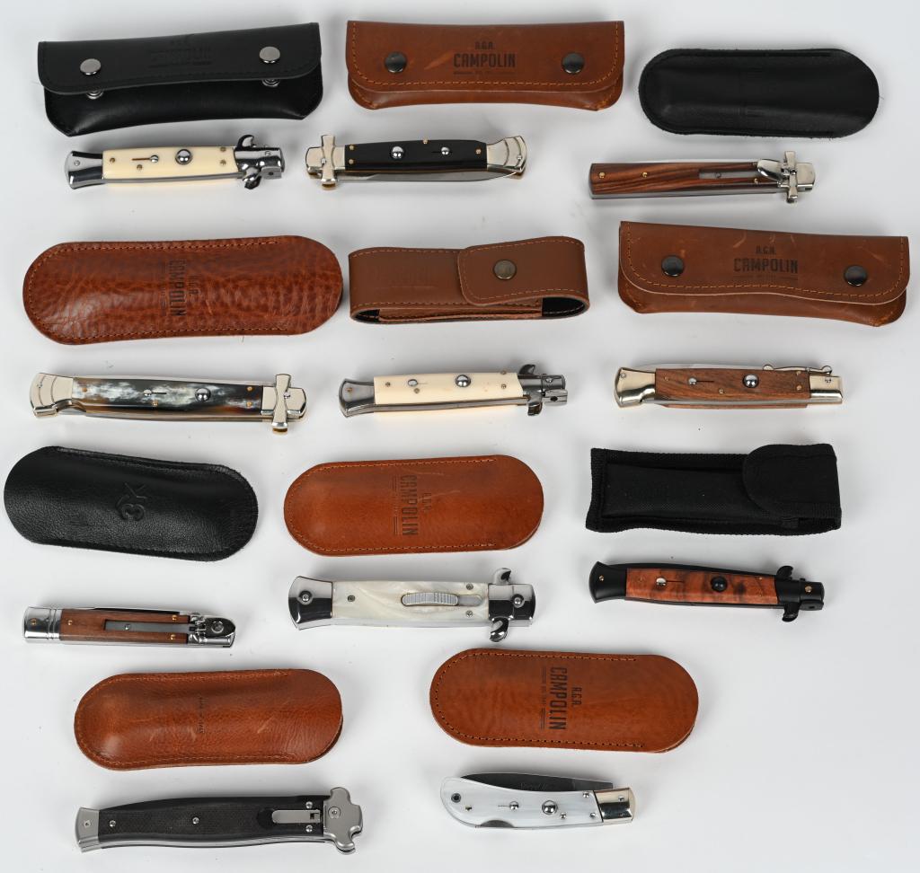 COLLECTORS LOT OF 11 ITALIAN SWITCHBLADE KNIVES: A wonderful collection of 11 different High Quality contemporary Italian automatic / switchblade knives with Horn, walnut, synthetic faux mother of pearl handles. All 11 knives are as new with carry c