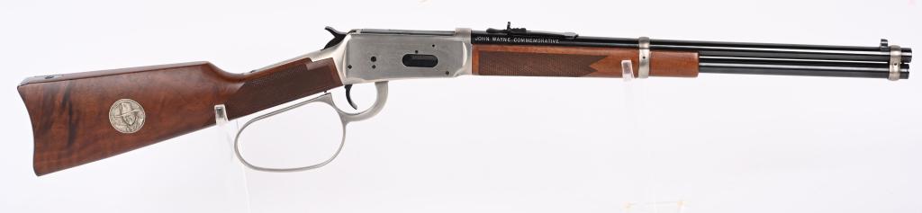 WINCHESTER MODEL 94 JOHN WAYNE COMMEMORATIVE: SERIAL NUMBER: JW11434. BARREL: 18-1/2". CALIBER: .32-40 WIN. MANUFACTURED: 1981. Standard John Wayne commemorative with proper markings on the barrel. Commemorative coin on the right side of the stoc