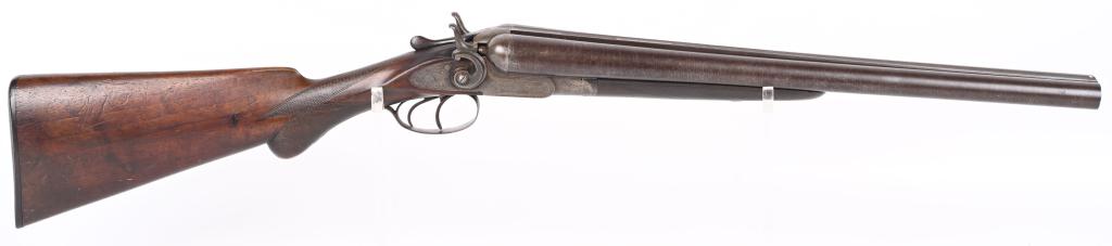E.C.MEACHAM 10 GA. HAMMER STAGE COACH GUN: SERIAL 93296. BARRELS 19 1/4". GAUGE 10. Rib stamped MEACHAM LAMINATED STEEL". Side plates stamped E.C.M.A. CO. Fine browned twist pattern barrels., exposed hammers, double triggers, splinter fore-end