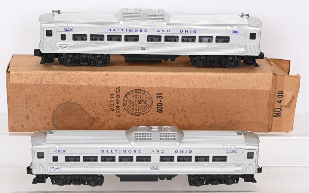LIONEL 400 B&O PASSENGER DIESEL & 2559 CAR: Includes 400 B&O Passenger Diesel, along with 2559 B&O Passenger Rail Car. Excellent , one with original box.