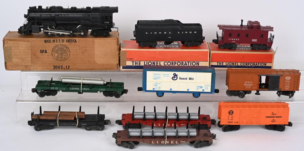 LIONEL #2065 ENGINE & FREIGHT CARS: Lionel #2065 Engine and #2046W Tender with #3461 Operating Log Car, #3363 Helium Tank Car, #6511 Flat car with Pipes, #6511 Flat Car with Pipes, #6024 Box Car, #3464 Operating Box Car, #9090 General M