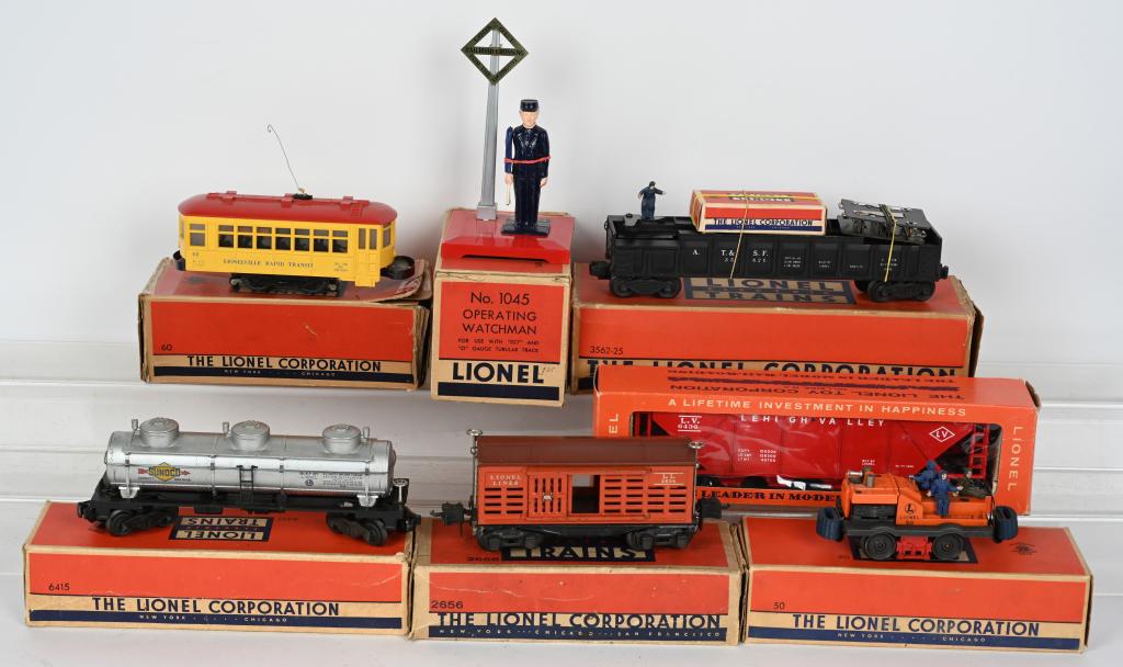 LIONEL #2018 ENGINE w/ FREIGHT CARS: Lionel #2018 Engine and #6026W tender with #3359 Coal Car, #3562-50 Barrel Car, #X2758 Box Car, #3927 Track Cleaner, and #9828 Caboose. All in reat original condition in Boxes. Excellent
