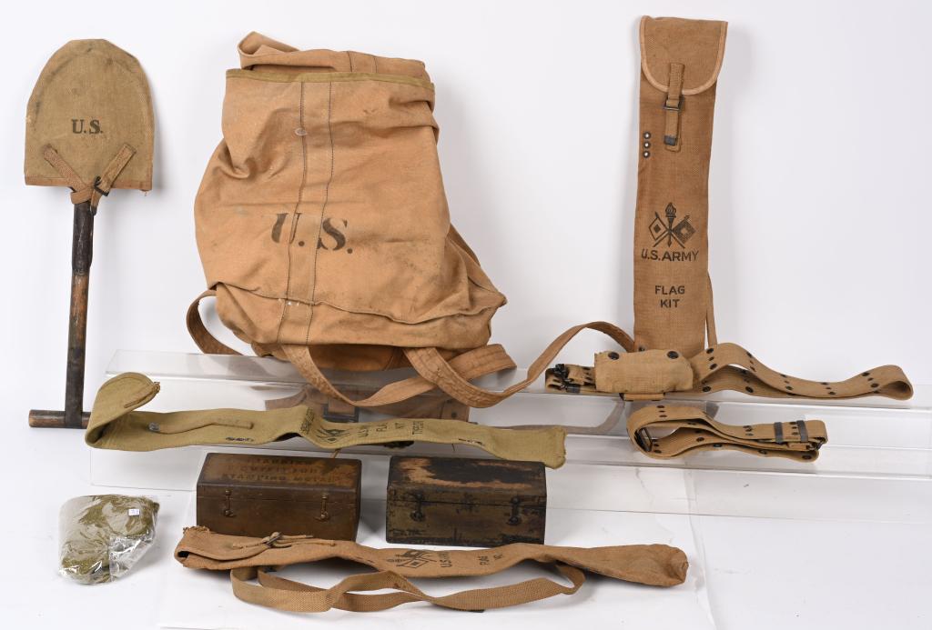 WWI US ARMY FIELD GEAR LOT T HANDLE POUCH BELTS: Lot of militaria to include 1) WWI US CASED DOG TAG KIT. US World War I Cased Dog Tag Manufacturing Kit. Wood box measures 7 15/16" wide by 4" tall by 3 3/16" deep. Contains the steel dies with letter