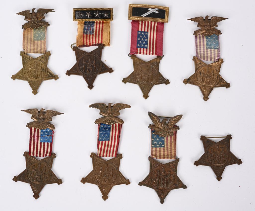 GAR MEMBERSHIP BADGE LOT OF 8 OFFICER HOLDERS: Lot of 8 GAR Membership Badges (one missing ribbon) with two officer holder badges Excellent. The Grand Army of the Republic (GAR) was a fraternal organization composed of veterans of the Union Army (