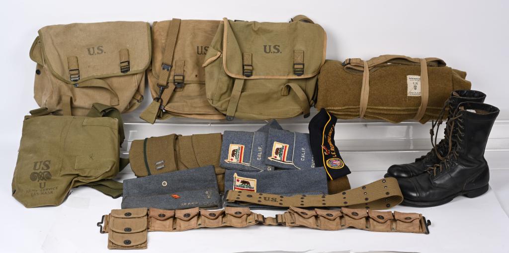 US MILITARY FIELD GEAR LOT AMMO BELT MUSETTE BAGS: US Field Gear lot to include 1) WWI US Army Service Blanket 2) WWI 40/8 Overseas Caps with Two Officers Overseas Caps one piped in Green, WWII Service Gas Mask, WWII US Army Officer Pistol Belt, WWI U