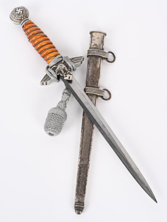 WWII NAZI GERMAN LUFTWAFFE OFFICERS DAGGER WW2: Roughly 29cm long, bright, nickel/silver plated, double edged, drop forged steel, stiletto style blade with a flat central plane. Maker marked Carl Eickhorn. The leather washer is still intact. The da