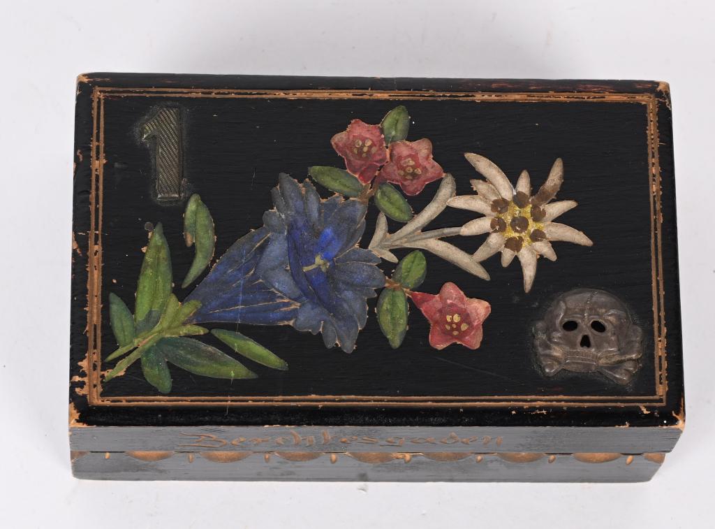 WWII NAZI GERMAN SOUVENIR PANZER BOX BERCHTESGADEN: WWII Nazi German wooden memento wooden box from Berchtesgaden. Box measures 4 1/2 X 2 3/4 and features a Edelweiss floral design that has been carved and hand painted. On the top of the left corner is