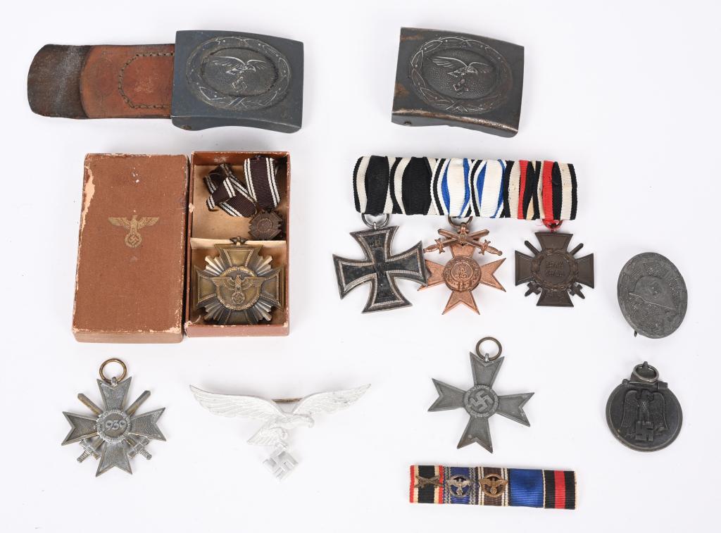 WWI IMPERIAL & WWII NAZI GERMAN MEDAL & BUCKLE LOT: WWII Nazi German lot to†include 1)†WWII NAZI GERMAN LUFTWAFFE OFFICER'S DRESS EAGLE.†Luftwaffe Officers Summer Tunic Breast Eagle. In silvered aluminum Hallmarked A for Assmann. Exce