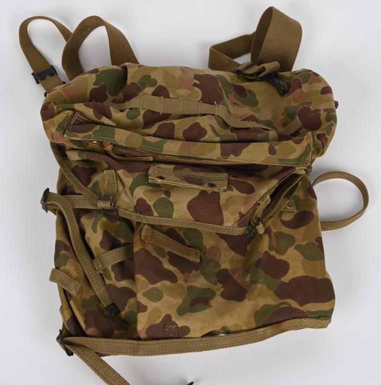WWII US ARMY USMC CAMO JUNGLE PACK DATED 1943 WW2: Fantastic WWII U.S. Army M-1943 Canvas Camouflage Jungle Combat Pack as used in the Pacific theater by both the USMC and the Army. This pack is in very good condition and complete with straps and a fu