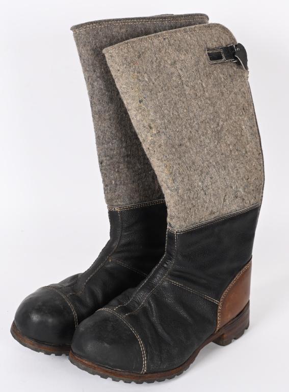 WW2 NAZI GERMAN RUSSIAN FRONT WOOL & LEATHER BOOTS: Coarsely woven, gray wool and brown leather construction boots are roughly 28.5cm tall from the top of the heel to the top of the back calf section. The top 11cm of the calves are constructed in wool.