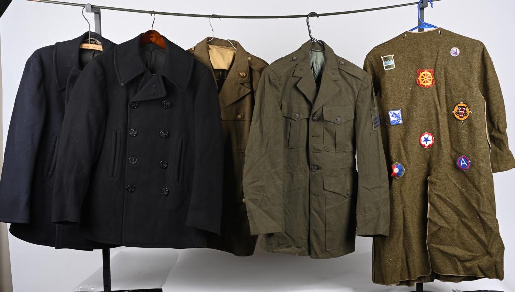 WWII KOREAN VIETNAM WAR UNIFORM LOT JACKETS ECT: Military uniform lot to include 1) US Navy Deck Trousers 2) WWII US Navy Peacoat 3) WWII US Navy Peacoat 4) Overcoat Lining with WWII US Patches that have been attached†to it. 5) Nylon Flight Ja