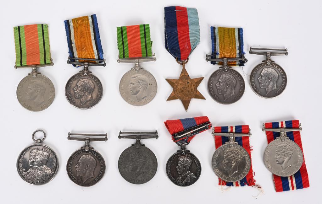 WW1 & WWII BRITISH MEDAL LOT FAITHFUL SERVICE WWI: British medal lot to include 1) King George V Faithful Service Medal named on the rim THOMAS EDWARDS BARTLETT 2) Great War Medal named on the rim AMOS C. HOAD 3) Great War Medal 4) Great War Medal mis