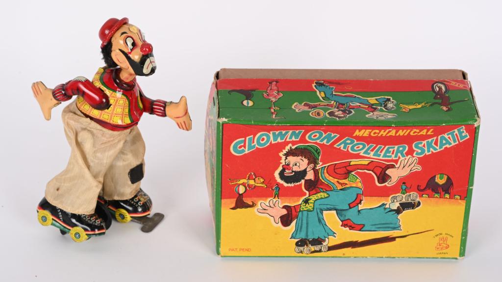 TPS TIN WINDUP CLOWN ROLLER SKATER w/ BOX (1 of 5)