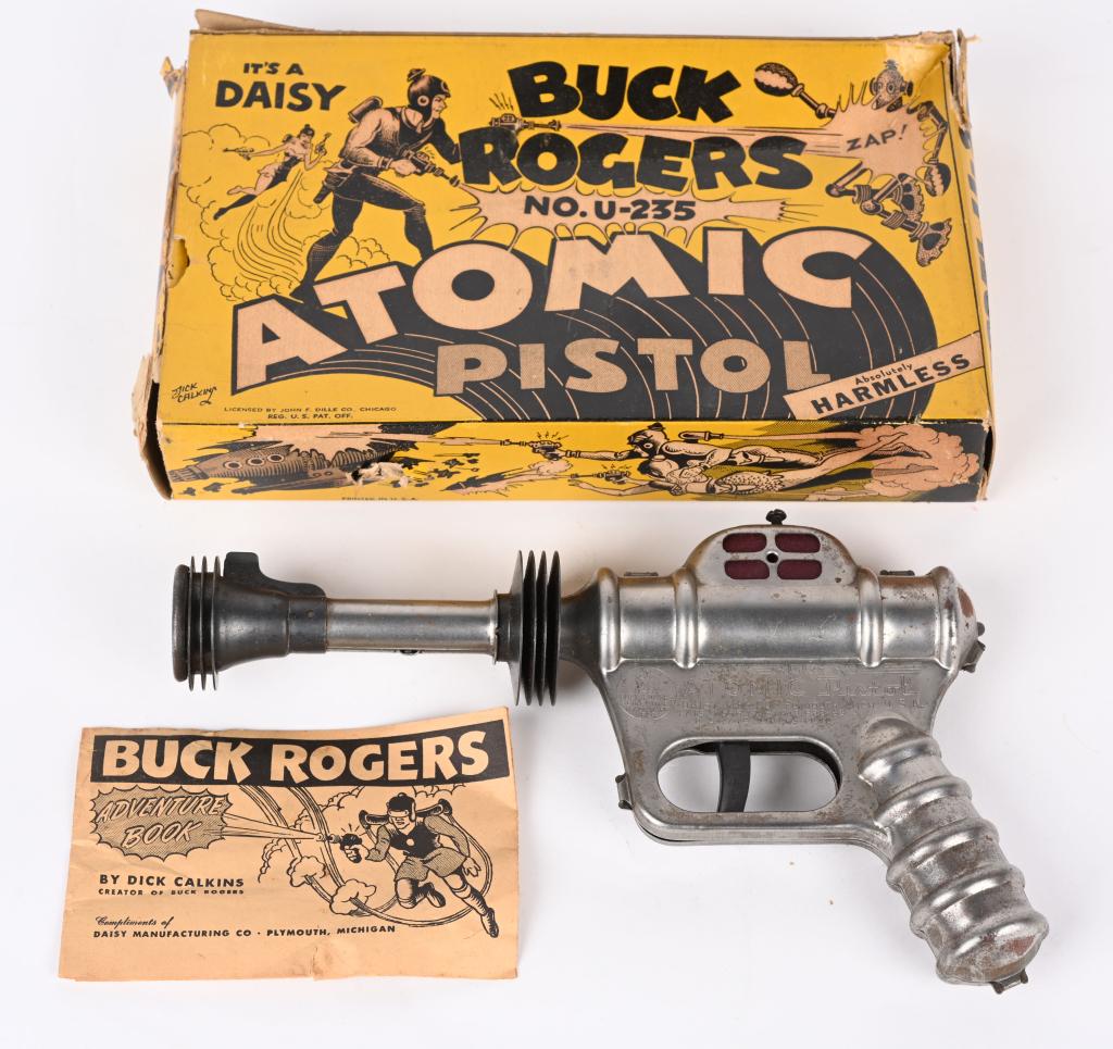 DAISY BUCK ROGERS ATOMIC PISTOL w/ BOX: All original and still works. Has some minor corrosion which should clean. Comes with Box and Adventure Book 10" Very Good-Excellent