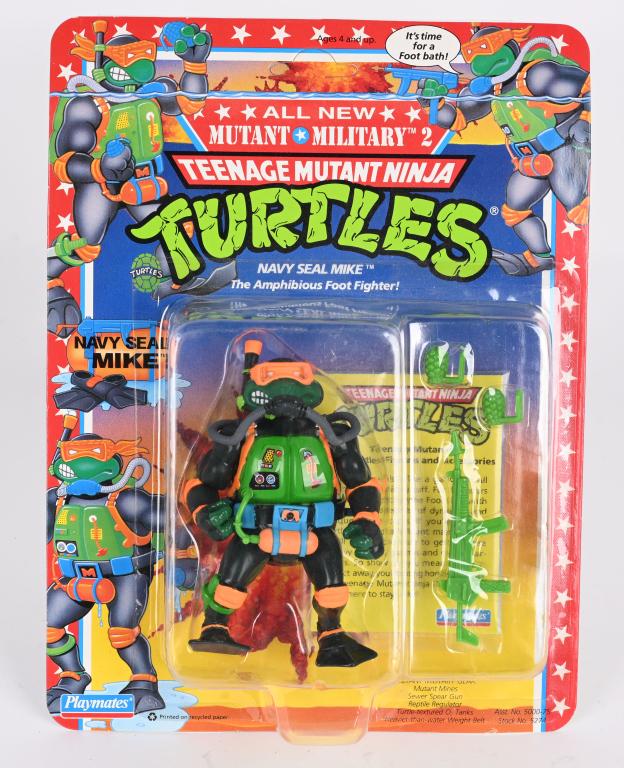 1991 TMNT NAVY SEAL MIKE MOC: 1991 Teenage Mutant Ninja Turtles Navy Seal Mike. Sealed on Card. Very clean unpunched card ready to grade.