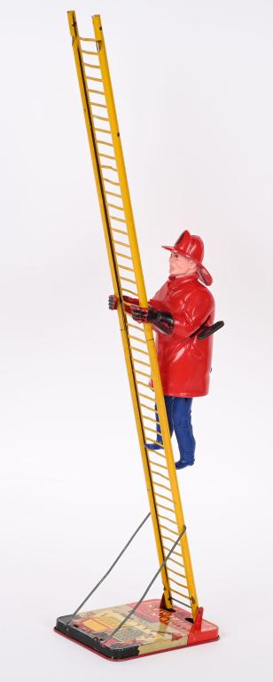 MARX TIN WINDUP CLIMBING FIREMAN (1 of 4)