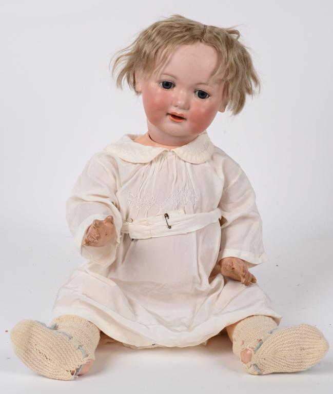 AM 327 GB BISQUE DOLL FOR GEO. BORGFELDT: 23". All bisque character baby, Blue glass eyes, open mouth with 2-teeth, blond wig, Head stamped G 327 B A 12 M Germany. Excellent with no cracks, small chip on body neck rear.