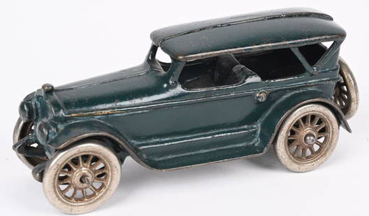 A.C. WILLIAMS CAST IRON LINCOLN TOURING CAR: A.C. Williams Lincoln Touring car. All original with nice dark green paint and nickel plated wheels. No cracks or breaks. 7", Excellent