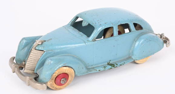 HUBLEY CAST IRON LINCOLN ZEPHYR SEDAN: Beautiful all original toy with original nickel plated grill and bumpers, and white rubber tires. Real nice Robin Egg blue paint with scattered minor loss. 7" No cracks or repairs. Excellent