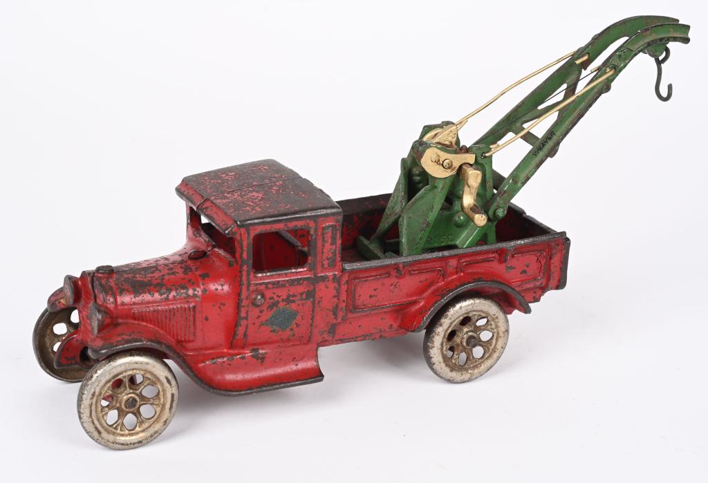 ARCADE CAST IRON MODEL A WRECKER TOW TRUCK: Arcade cast iron Model A wrecker tow truck. All original with no cracks or repairs. 10 1/2" Very Good
