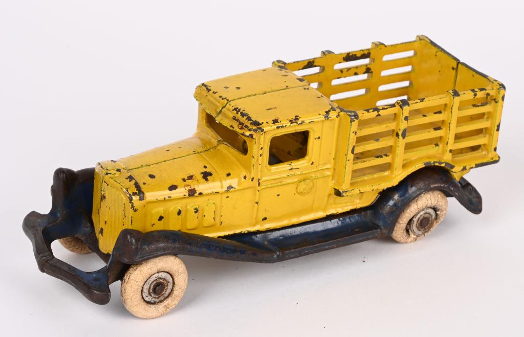 A.C. WILLIAMS CAST IRON LARGE STAKE TRUCK 8": Hard to find large size of the AC Williams take-a-part stake truck. No cracks or repairs. 8", Very Good-Excellent
