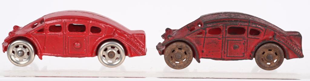 2- A.C. WILLIAMS CAST IRON BURNEY SEDANS: Lot of 2 scarce 1930's A.C. Williams Burney Sedans. One has original paint with small hairline at windshield post. The other has been correctly restored. These are hard to find in any condition. 5" Ve