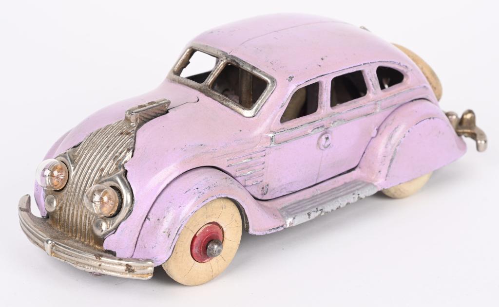 HUBLEY CAST IRON LAVENDER ELECTRIC LIGHT AIRFLOW: Hubley cast iron Electric Light Airflow. Very nice toy with scarce original lavender paint. Has nice plating and original white rubber tires. Bulbs are later replacements and are untested. Missing spr