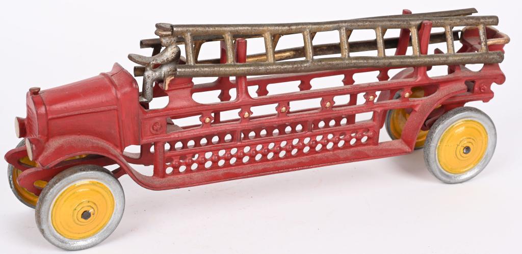 DENT CAST IRON FIRE LADDER TRUCK: Original Dent Fire Ladder Truck that has been over painted. Includes driver and ladders. No cracks or repairs, just an old overpaint that displays well. 12". Very Good