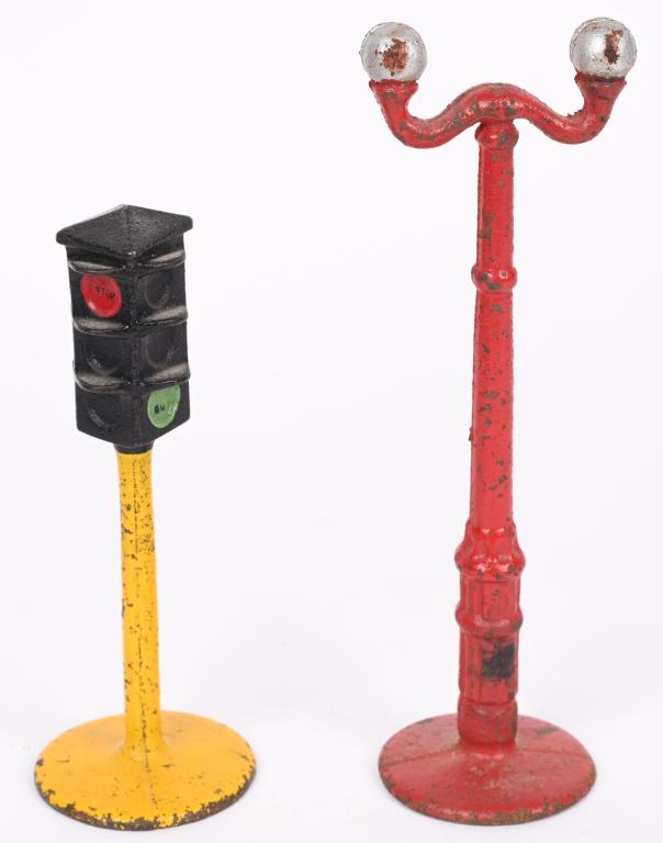 2- KILGORE CAST IRON BILLY BOY TOY ACCESSORIES: Lot includes a cast iron Traffic Light along with a Street Lamp. Largest is 7". Very Good-Excellent