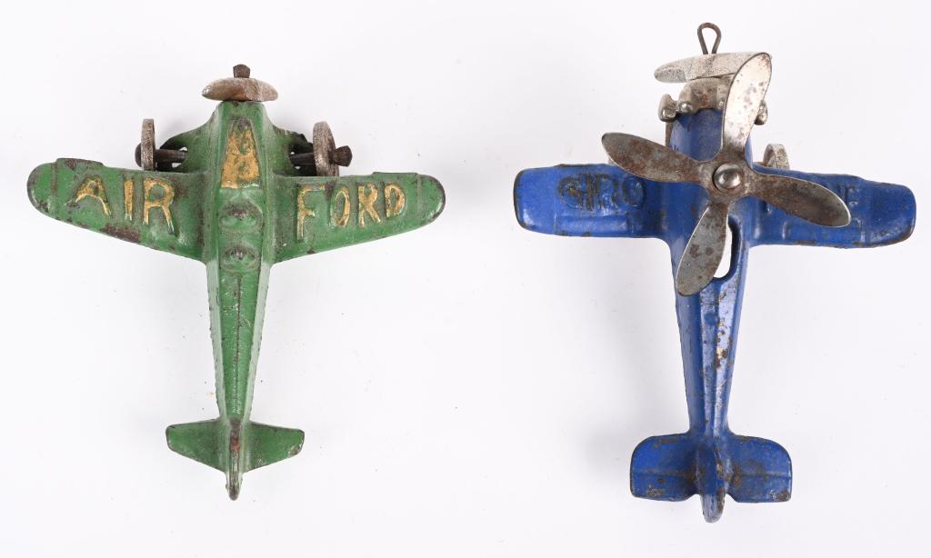 2- HUBLEY CAST IRON AIRPLANES: Lot includes an Air Ford and Giro Plane. Both are all original with no cracks or repairs. Largest is 4". Very Good-Excellent