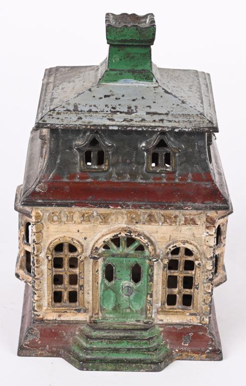 J&E STEVENS CITY BANK w/ CHIMNEY: J&E Stevens cast iron City Bank with Chimney. All original colorful bank. No breaks or repairs. Scarce bank. 7 1/4" Very Good
