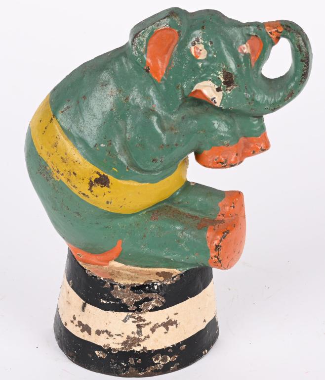 TAYLOR COOL CAST IRON ELEPHANT ON TUB DOOR STOP: 1930 Taylor Cool Elephant on Tub Door Stop. All original with great colors. Marked on back side. 8 1/2" Excellent