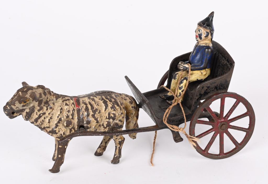 HARRIS CAST IRON SHEEP CART w/ BROWNIE: Harris cast iron Sheep cart with Brownie. All original with decent paints. 7 1/2" Excellent