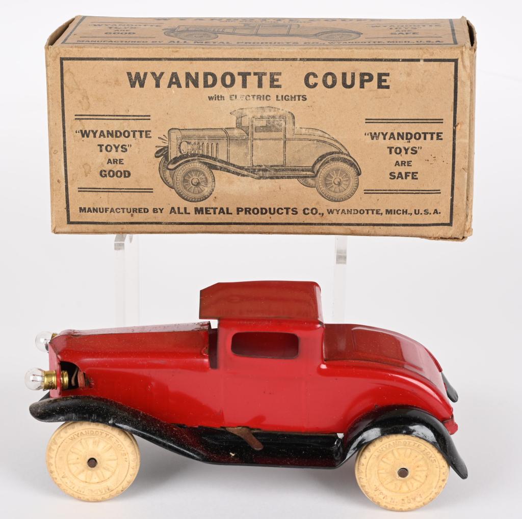 WYANDOTTE PRESSED STEEL COUPE w/ BOX: Wyandotte pressed steel Coupe. All original condition with Electric Headlights. Still has original white rubber tires. Comes with Box. 8 1/2" Excellent