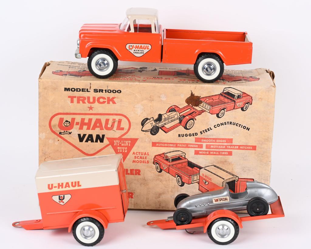 NYLINT #SR1000 UHAUL TRUCK & RACE CAR SET w/ BOX: Nylint #SR1000 Uhaul Ford Truck, Uhaul Trailer, Platform Trailer, and Big Track Racer. Set is all original and complete. Looks never played with condition. Boxed 18" Excellent