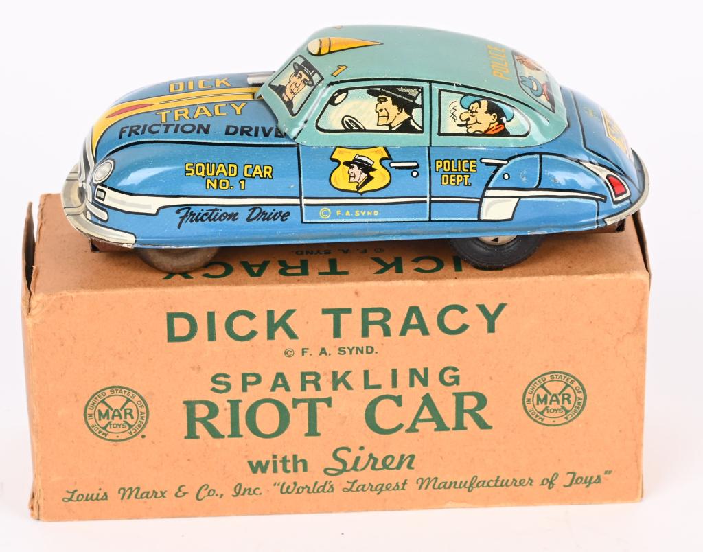 MARX DICK TRACY FRICTION BLUE RIOT CAR w/ BOX: Scarce small version two tone blue Dick Tracy Car with gun in the windshield and the original box. Colors are very nice. The friction motor works well. There is no sparking or siren sound. The origina