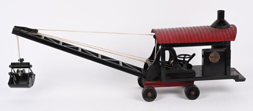 BUDDY L PRESSED STEEL STEAM DREDGER CLAM SHELL: Buddy L pressed steel Steam dredger with Clam Shell. All original with nice paint and decal. A very hard to find early Buddy L. 20" Excellent