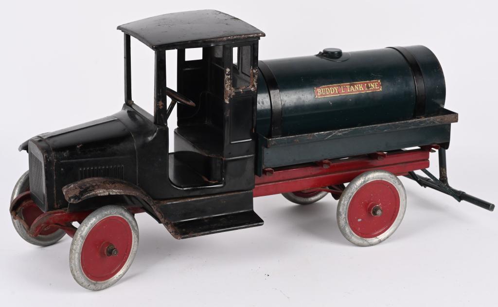 BUDDY L PRESSED STEEL TANK LINE TRUCK: Buddy L pressed steel Tank Line Truck. All original condition with nice paint and decals. Has some typical wear. Displays great. Still has brass spigot and tank cap. Comes with Spray Bar. 24" Excellen