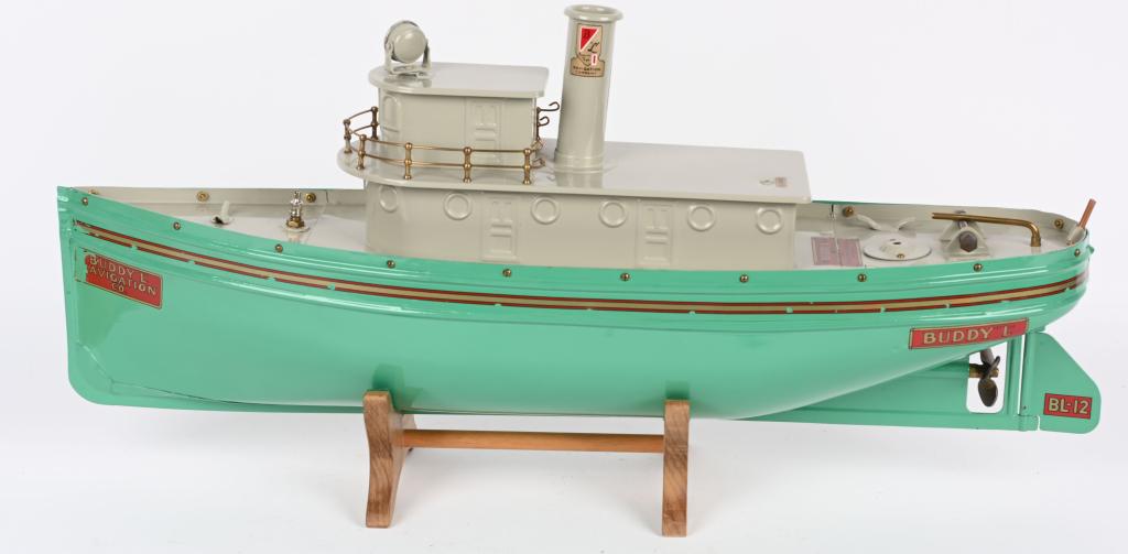BUDDY L PRESSED STEEL TUG BOAT: ORIGINAL RESTORED Buddy L pressed steel Tug Boat. This is an original toy that has been professionally restored. Very well done and looks like new. A very RARE Buddy L toy! 28" Excellent